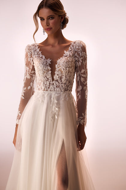 Lace wedding dress with long sleeves Calista Cristal from DAMA Couture (studio front picture)