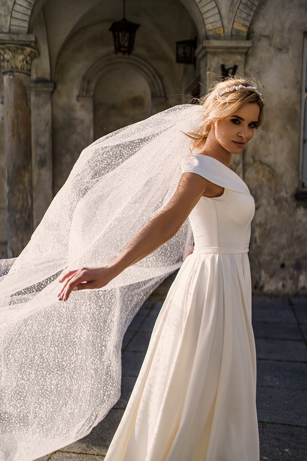 Cathedral snowdrop veil – DAMA Couture cathedral wedding veil, front view.