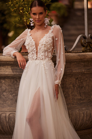Romantic lace a-line wedding dress with detachable sleeves from DAMA Couture (main photo)