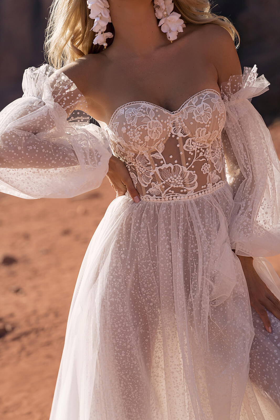 Wedding dress Shira – A-line wedding dress with long sleeves by DAMA Couture.
