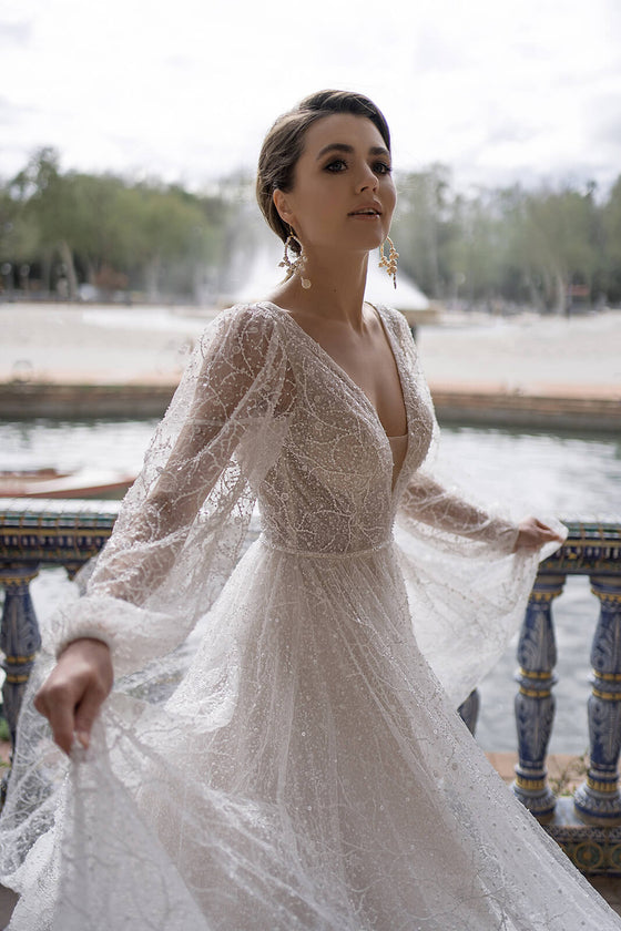 Suri – wedding dress by DAMA Couture.