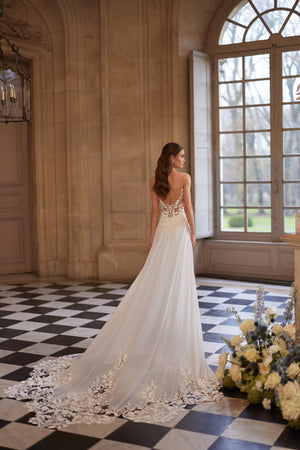 Agapia wedding dress from the Something Blue 2027 collection – a floral lace bodice, slender straps and airy chiffon skirt.
