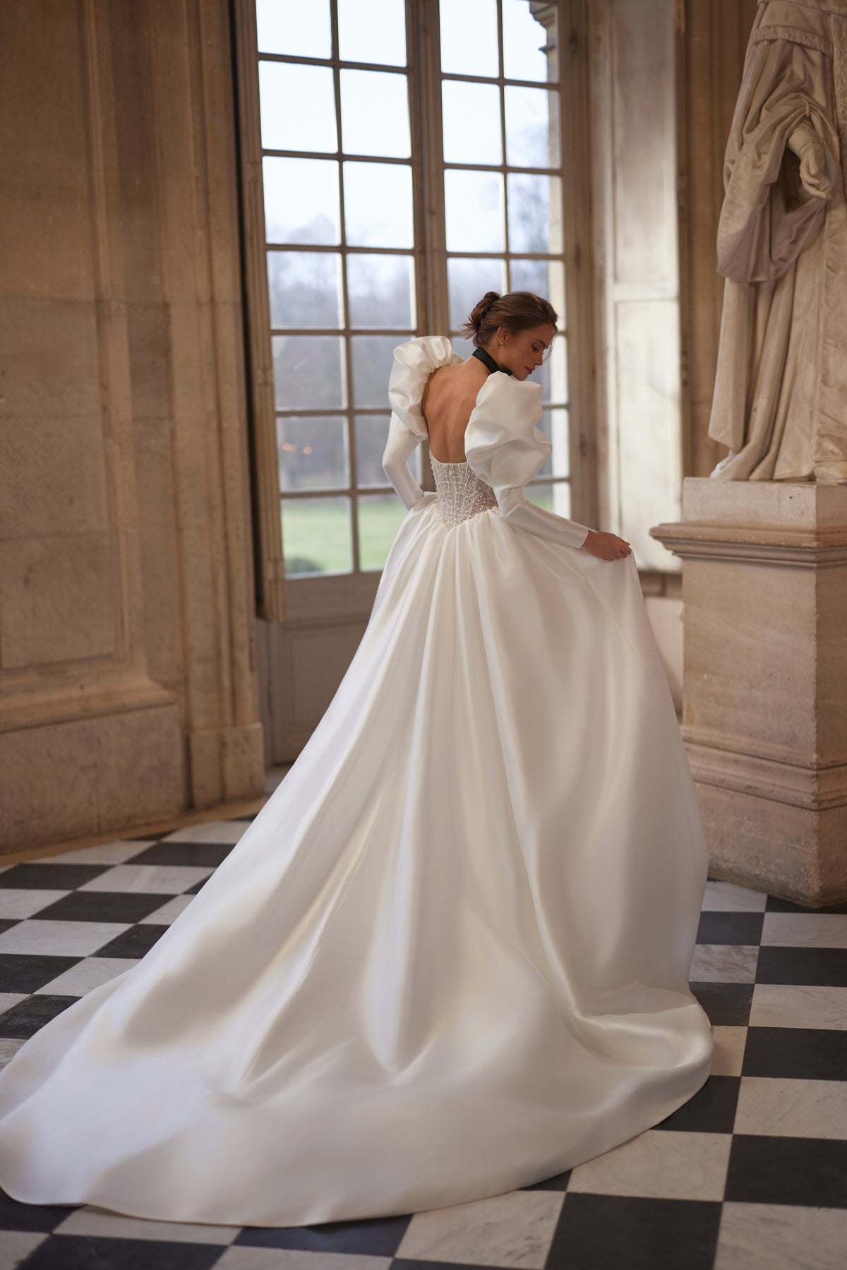 Aliette wedding dress from the Something Blue 2027 collection – a crystal-embellished corset and voluminous sleeves.