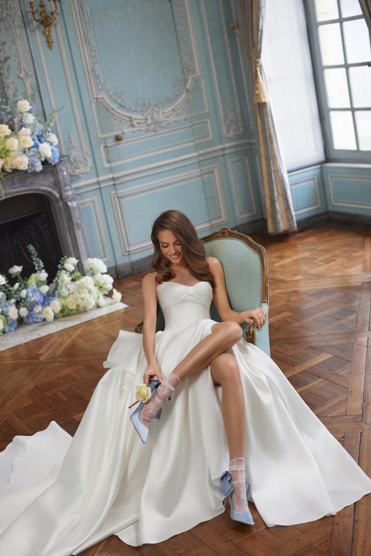Alizee wedding dress – a folded strapless neckline and draped satin skirt, DAMA Couture Something Blue 2027.
