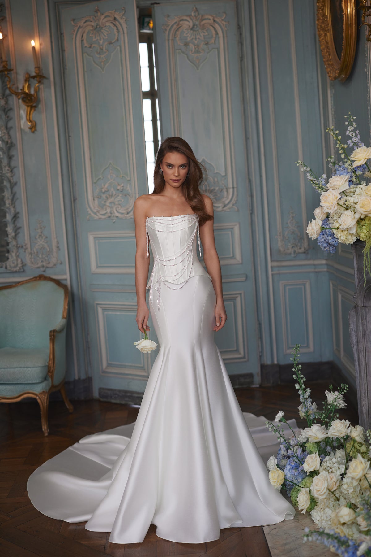 Armance wedding dress – A-line bridal gown with a corset bodice draped with strands of pearls.