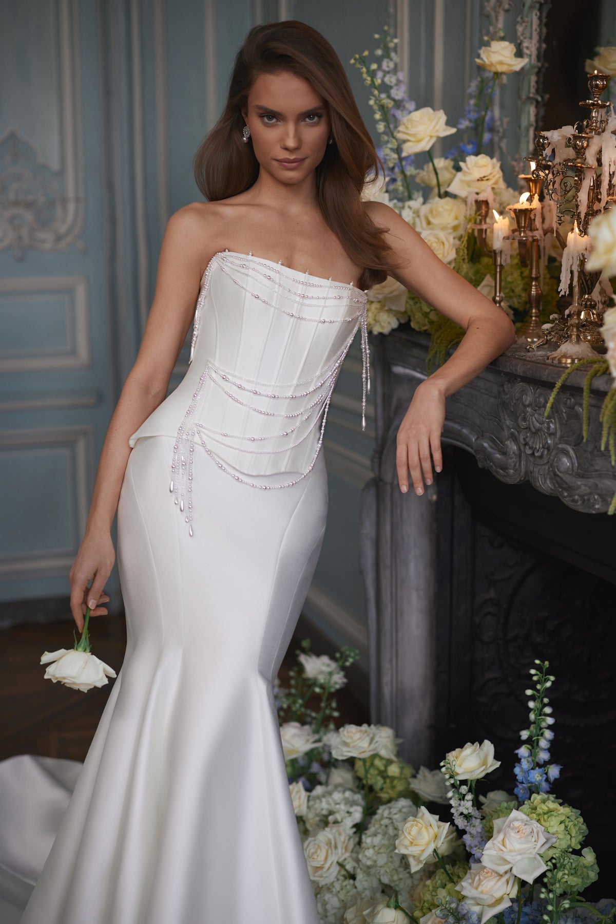 Armance wedding dress – a corset bodice draped with strands of pearls.