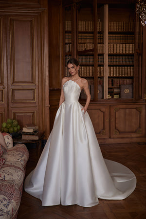 Shella wedding dress – a sculpted strapless corset and full satin skirt.