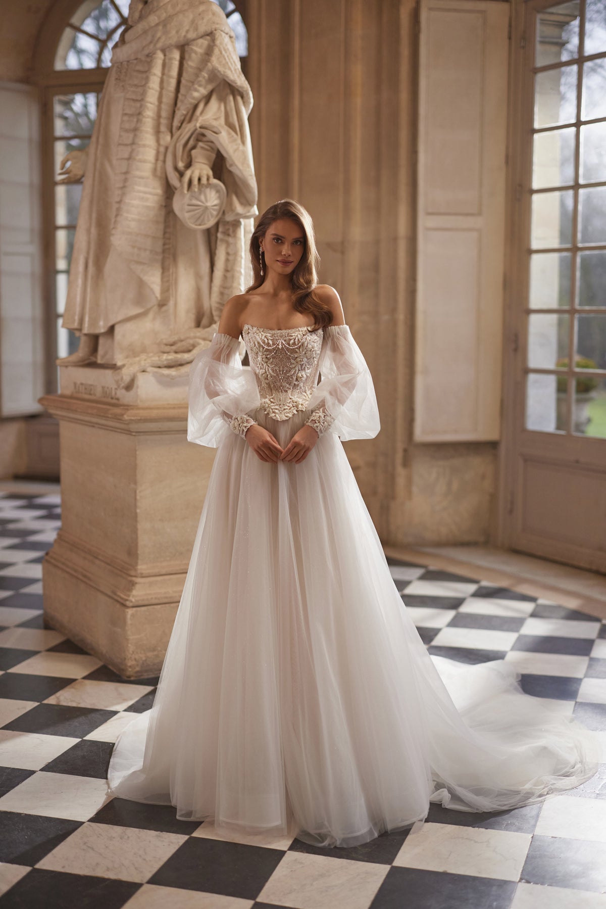 Tara sleeves – voluminous off-the-shoulder tulle sleeves with floral appliqué cuffs, worn with the Tara corset.