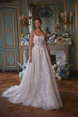 Thetis wedding dress – bridal gown with sheer corsetry, lace straps and an opulent lace skirt, DAMA Couture.