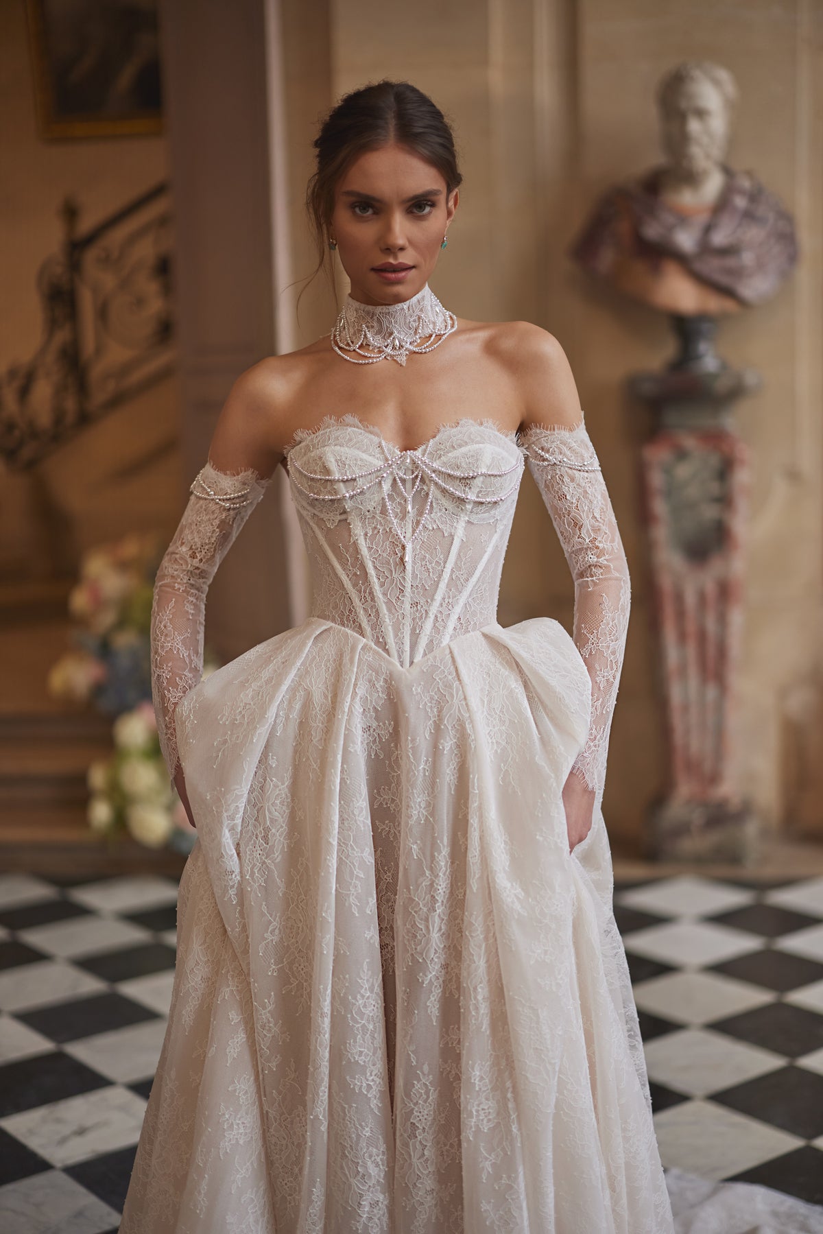 Blanche wedding dress from the Something Blue 2027 collection – a beaded corset, soft lace skirt and off-the-shoulder sleeves.