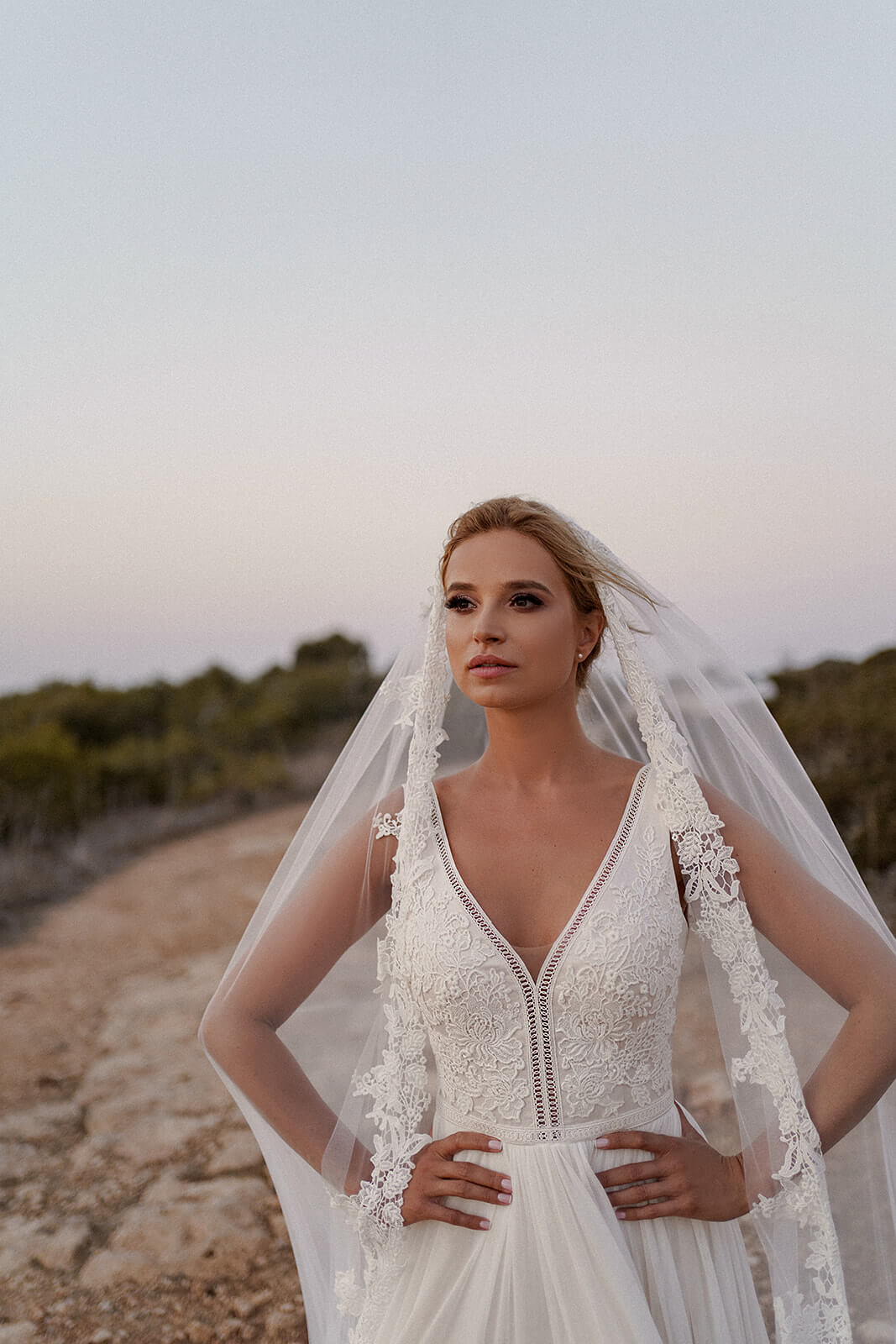 Cathedral veil with lace – DAMA Couture cathedral wedding veil, front view.