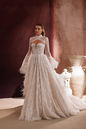 The Michelle bridal lace bolero with long sleeves and high neckline adds elegance and sophistication to any wedding dress.