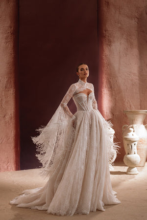 The Michelle wedding dress features a lace corset bodice with a high neck, blending romantic charm and modern couture style.