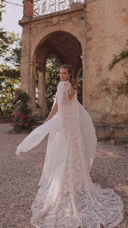 Bohemian wedding dress Cassidy with sleeves for destination wedding from DAMA Couture (campaign video)