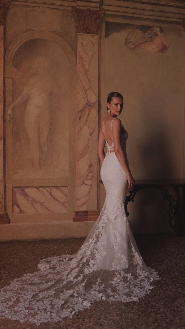 Mermaid wedding dress with plain skirt and train Apolonia from DAMA Couture campaign video
