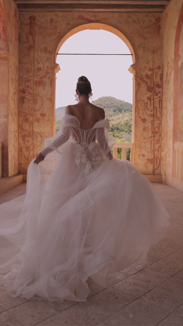 Princess wedding dress with falling sleeves Avalon from DAMA Couture (campaign video)