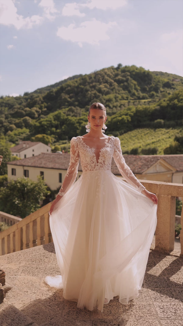 Lace wedding dress with long sleeves Calista Cristal from DAMA Couture (campaign video)