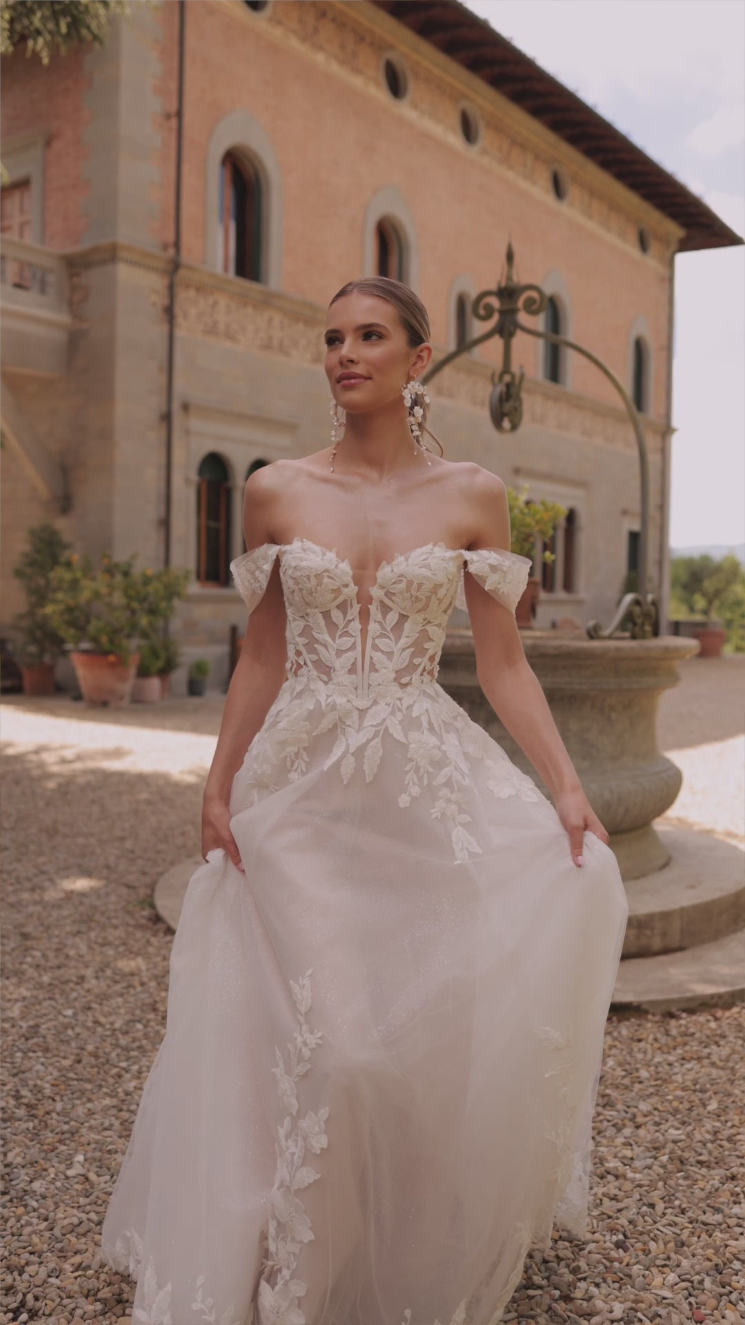 Princess wedding dress with falling sleeves Aurora from DAMA Couture  (campaign video)