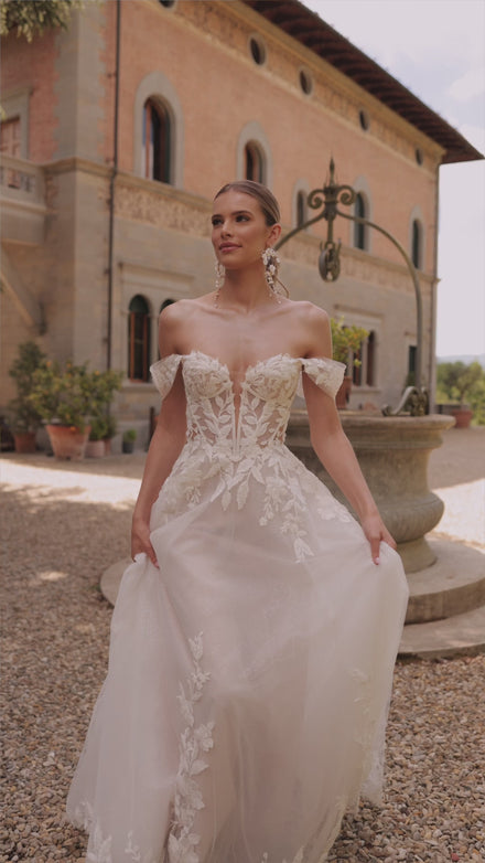 Princess wedding dress with falling sleeves Aurora from DAMA Couture (campaign video)