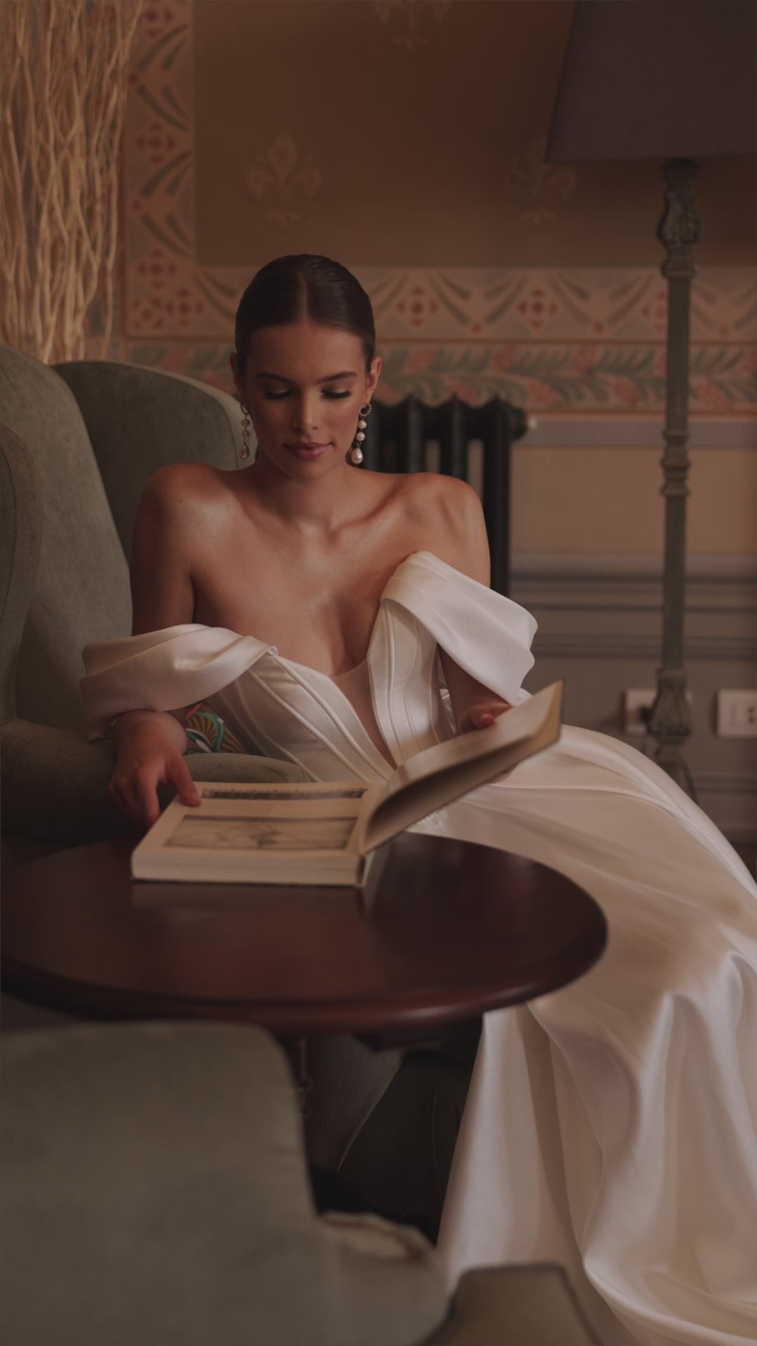 Classic simple wedding dress with falling sleeves Thalia from DAMA Couture  (campaign video) photo)